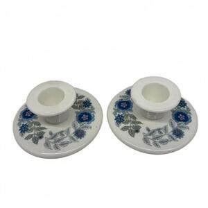 A pair of Wedgwood Clementine bone china floral candlestick holders